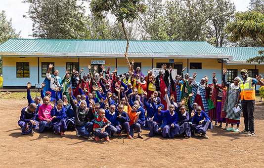 Elders and students at Emariete School, located in the Maasai village of Monduli Juu, Tanzania